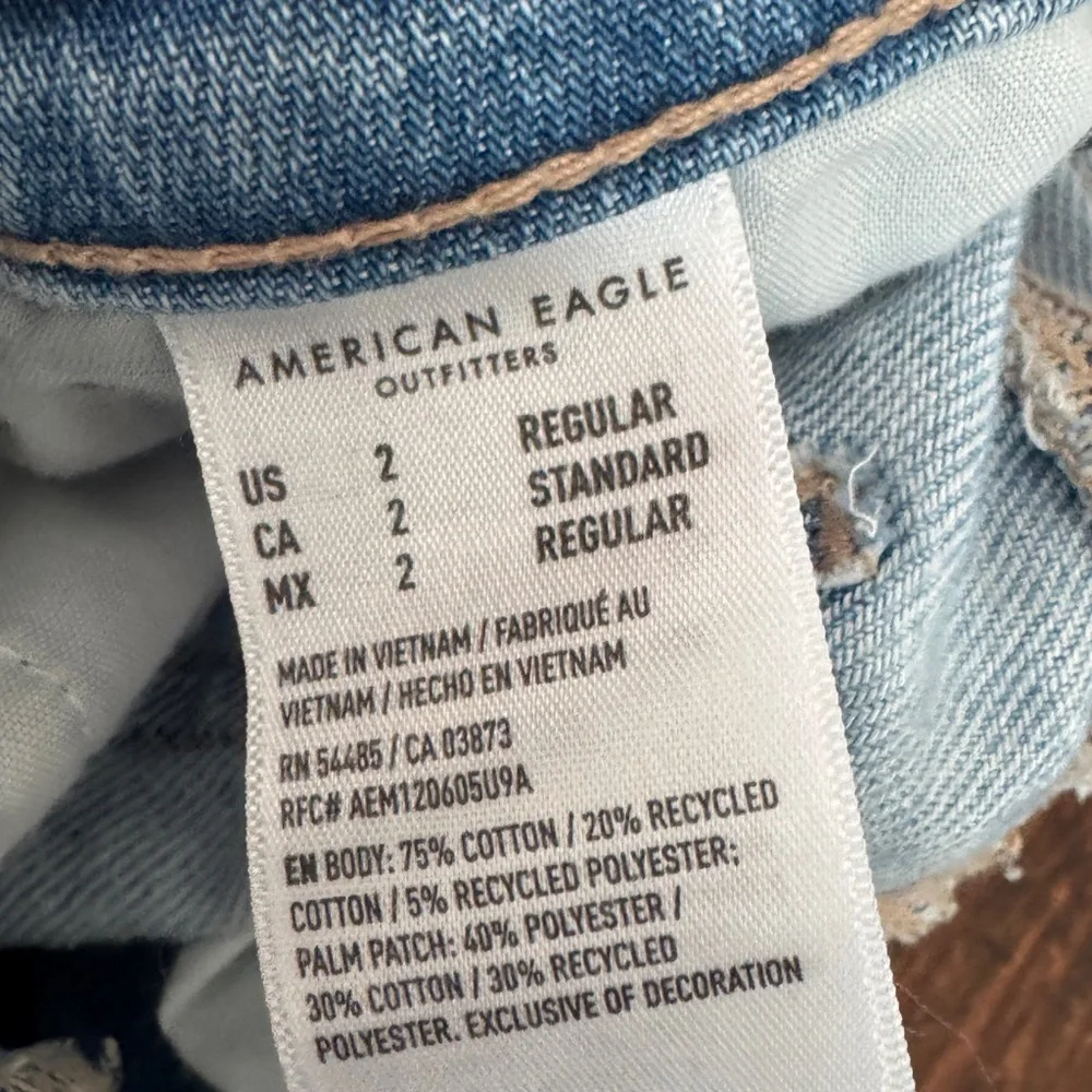 American Eagle Outfitters Light Wash Straight-Leg Jeans with Blue Floral Patches - Picture 5 of 6